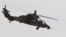 FILE - An Airbus Tiger helicopter photographed at the Bemowo airport in Warsaw, Poland, Aug. 27, 2015.