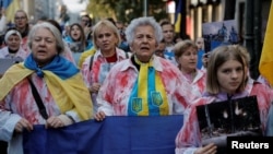 Українці в Греції на акції протесту на другі роковини повномасштабного вторгнення Росії до України
