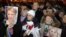  Supporters of the Ukrainian Opposition party hold up photos of the imprisoned former Ukrainian PM, Yulia Tymoshenko, whilst taking part in a rally outside the Central Elections Commission building in Kiev, Ukraine, November 12, 2012.