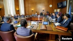 Iran's Deputy Foreign Minister Hossein Jaberi Ansari, Russia's special envoy on Syria Alexander Lavrentiev, Turkish Deputy Foreign Minister Sedat Onal, and U.N. Special Envoy for Syria Staffan de Mistura attend a meeting on Syria in Geneva, Switzerland, Sept. 11, 2018.