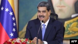 Handout photo released by Miraflores presidential palace press office shows Venezuela's President Nicolas Maduro da cabinet meeting with the National Defense Council and the Council of State at the Foreign Ministry building in Caracas, Venezuela on Aug. 12, 2024. 