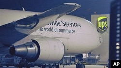 A cargo plane parks at the UPS distribution center at the International Cargo Airport in Cologne, western Germany, 01 Nov 2010. After intercepting two mail bombs addressed to Chicago-area synagogues, investigators found out that packages that terrorists i