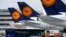FILE - Lufthansa aircrafts sit on the tarmac at Frankfurt airport, July 12, 2013. 