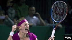 Ekspresi Petra Kvitova saat memenangkan final kejuaraan tenis WTA melawan Victoria Azarenka di Istambul, Turki (30/10).