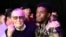 FILE - Comic book legend Stan Lee (L), creator of the "Black Panther" superhero, poses with Chadwick Boseman, star of the new "Black Panther" film, at the premiere at The Dolby Theatre in Los Angeles, Jan. 29, 2018.