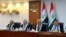 Iraqi judges attend a court session at the Supreme Judicial Council in Baghdad on Dec. 27, 2021, as the court is set to announce the verdict in the bid filed by the Hashed al-Shaabi ex-paramilitary alliance. 