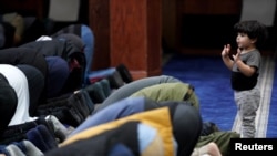 FILE - Palestinian Americans pray at a mosque after Dearborn's mayor said the city's police were ramping up security across places of worship following an opinion piece in the Wall Street Journal that he called"Islamophobic," in Dearborn, Michigan, U.S. February 4, 2024.