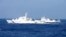 Chinese marine surveillance ship Haijian No. 51 (R) cruises next to a Japan Coast Guard patrol ship, Akaishi, in the East China Sea near the disputed isles known as Senkaku isles in Japan and Diaoyu islands in China, Feb. 4, 2013.