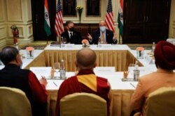 U.S. Secretary of State Antony Blinken and U.S. Ambassador to India Atul Keshap deliver remarks to civil society organization representatives in a meeting room at the Leela Palace Hotel in New Delhi, India, July 28, 2021.