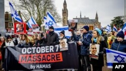 FILE - Israeli sympathizers take part in a demonstration during a hearing at the International Court of Justice on a genocide complaint by South Africa against Israel, in The Hague, on January 11, 2024.