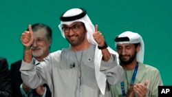 FILE — COP28 President Sultan al-Jaber gestures at the end of the COP28 U.N. Climate Summit, December 13, 2023, in Dubai, United Arab Emirates.