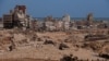 2023 年9月14日，利比亚德尔纳洪水过后，人们在检查受损地区。 （路透社图片）