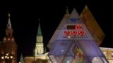 The countdown clock showing 100 days left until the start of 2014 Winter Olympic Games is on display at Manezhnaya square in downtown Moscow, Russia.