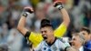 Pemain Argentina Marcos Rojo merayakan kemenangan setelah Argentina mengalahkan Belanda 4-2 dalam adu penalti setelah skor imbang 0-0 dan melaju ke babak final Piala Dunia, 9 Juli 2014.
