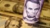 FOTO DE ARCHIVO: Billetes de dólares estadounidenses en una imagen ilustrativa tomada el 14 de junio de 2022. REUTERS/Florence Lo 