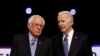 Desde la izquierda, los candidatos presidenciales demócratas, el senador Bernie Sanders, y el exvicepresidente Joe Biden, hablan antes de un debate primario presidencial demócrata, el martes 25 de febrero de 2020 en Charleston, Carolina del Sur (AP Photo / Matt Rourke)