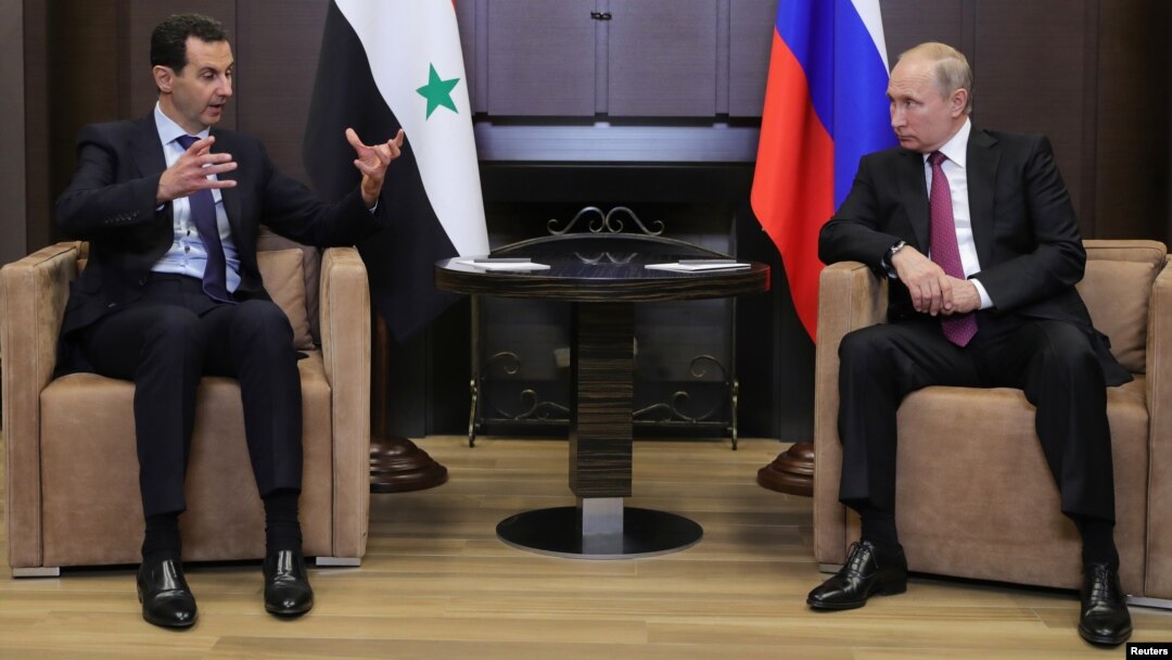 Presiden Suriah Bashar al-Assad (kiri) bertemu dengan Presiden Rusia Vladimir Putin di Sochi, Rusia, 17 Mei 2018. (Foto: dok).