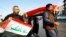 Mourners carry the coffin of a demonstrator who was killed at an anti-government protest in Nassiriya, during a funeral in Najaf, Iraq, Nov. 28, 2019.