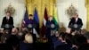 President Donald Trump speaks during a news conference with, from left, Latvian President Raimonds Vejonis, Estonian President Kersti Kaljulaid, and Lithuanian President Dalia Grybauskaite in the East Room of the White House, April 3, 2018, in Washington.