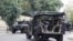  Lebanese Army soldiers sit in their military vehicles as they are deployed to secure the area near the French embassy in Beirut, September 21, 2012.