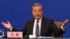 Chinese Foreign Minister Wang Yi speaks during a press conference on the sideline of the National People's Congress in Beijing, March 7, 2025. 