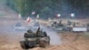 Фото для ілюстрації: танки та бойові машини США, Італії, Канади та Польщі на навчаннях НАТО в Латвії, 2021 рік