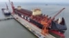 FILE - A ship is seen under construction at a shipbuilding facility at the port in Taicang, in China’s eastern Jiangsu province on Feb. 19, 2025. 