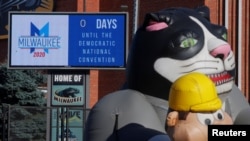 Union demonstrators display inflatable animals outside the Wisconsin Center, the site of the Democratic National Convention (DNC), which will be a largely virtual event due to the coronavirus outbreak, in Milwaukee, Wisconsin, Aug. 17, 2020.