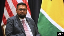 FILE - Guyanese President Irfaan Ali attends a meeting at the United Nations headquarters in New York, Sept. 23, 2024. On Saturday, the U.S. denounced what it said were Venezuelan naval vessels threatening an ExxonMobil unit in maritime territory claimed by Guyana. 