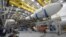 The Falcon 9 rocket and DART spacecraft readied for launch are seen at the SpaceX hanger, Vandenberg Space Force Base in California, Nov. 22, 2021. 