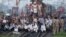 Demonstrators from the Samajwadi Party, a regional political party, shout slogans after they stopped a passenger train during a protest near Allahabad railway station, September 20, 2012. 