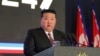 In this photo provided by the North Korean government, North Korean leader Kim Jong Un delivers a speech during an opening ceremony of a defense exhibition in Pyongyang, North Korea, Nov. 21, 2024. 