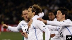 Diego Forlan et l'Uruguay heureux