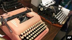 Vintage typewriters are on display at a "type-in" in Albuquerque, N.M., April 23, 2017. "Type-ins" are social gatherings in public places where typewriter fans test different vintage machines.