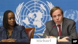 United States' Michael Posner, right, Assistant Secretary of State for Democracy Human Rights and Labor, and United States' Esther Brimmer, left, Assistant Secretary of State for International Organizations Affairs, attend a press conference after the Un