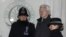 Julian Assange walked by two bobbies in to Supreme Court in London