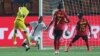 FILE: Zimbabwe's Khama Billiat, left, scores his side's opening goal during the group A soccer match between Uganda and Zimbabwe at the Africa Cup of Nations at Cairo International Stadium in Cairo, Egypt, Wednesday, June 26, 2019. (AP Photo/Hassan Ammar)