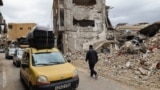 Cars transport mattresses as displaced people make their way back to their homes in the south of Lebanon after a ceasefire between Israel and Hezbollah took effect, on November 27, 2024, in the southern town of Qana.