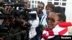 Zimbabwe's Lawyers For Human Rights (ZLHR) Board Member Beatrice Mtetwa speaks to the media outside the High Court after she was granted a $500 bail in Harare, March 25, 2013. (File Photo) 