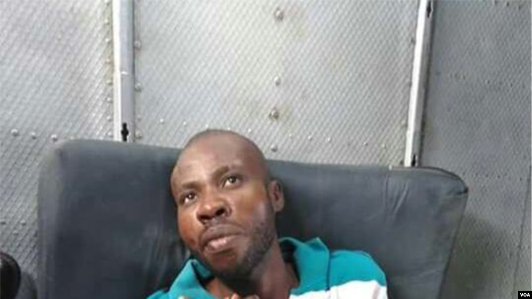 FILE - Arnel Joseph dressed and on a stretcher as a UN helicopter prepares to transfer him to Port au Prince, Haiti, in 2019.