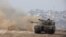 Xe tăng Israel đang bắn về phía dải Gaza