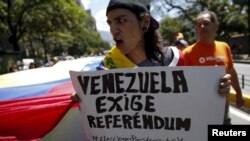 La oposición ha estado realizando manifestaciones en Venezuela para exigir la convocatoria a un referéndum revocatorio este año.