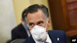 Sen. Mitt Romney, R-Utah, arrives on Capitol Hill in Washington, June 10, 2020. 