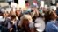 A woman uses a megaphone during a protest billed "Croatia can do better," against what demonstrators say is political meddling in education reform, on Zagreb's main square, Croatia, June 1, 2016.