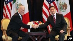 El vicepresidente Joe Biden y Enrique Peña Nieto cuando éste era candidato a la presidencia de México, en marzo de 2012.