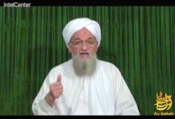 FILE - Al-Qaida's Ayman al-Zawahiri urges the people of Pakistan to follow the example of Muslims in Egypt and Tunisia and revolt in a recent video released on the Internet.