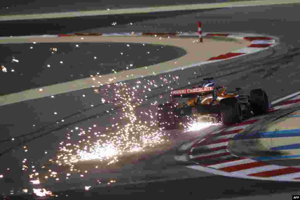 McLaren&#39;s Spanish driver Carlos Sainz Jr drives during the third practice session ahead of the Bahrain Formula One Grand Prix at the Bahrain International Circuit in the city of Sakhir, Dec. 5, 2020.