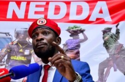 FILE - Ugandan musician turned politician, Robert Kyagulanyi, also known as Bobi Wine, addresses a news conference over the government handling of the coronavirus disease (COVID-19) pandemic, in Kampala, Uganda June 15, 2020.