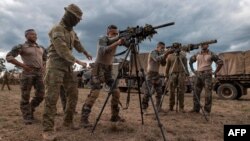 Prajurit dari Battle Group Ram dan Angkatan Bersenjata Prancis di Kaledonia Baru tengah berlatih di Lapangan Townsville untuk persiapan Latihan Talisman Sabre, 19 Juli 2023. (CPL Nicole Dorrett / DEPARTEMEN PERTAHANAN AUSTRALIA / AFP)