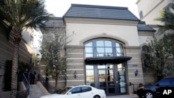 FILE - This March 3, 2015 file photo shows an upscale apartment complex where authorities say a birth tourism business charged pregnant women for lodging, food and transportation, in Irvine, Calif.